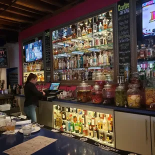 a woman ordering drinks