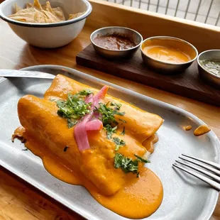 Delicious chicken enchiladas with the habanero crema sauce, and the salsa trio with chips. All fresh and delicious!