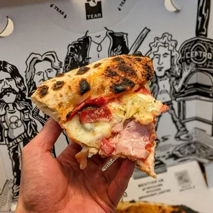 7/8/23: Capricciosa - Salami, Ham, Artichokle, tomoto, mozerlla, basil. Quality toppings. Soggy middle (as expected)