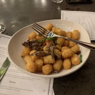 &quot;Loaded&quot; tater tots- thats all the bratwurst crumbles you get with a little cheese sauce at the bottom.