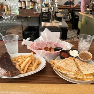 Steak and fried and taco Tuesday chicken quesadilla with house salsa.
