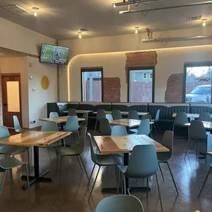 Interior seating and 3 TVs.