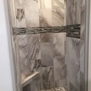 Shower with Manhattan accent linear. Wow!