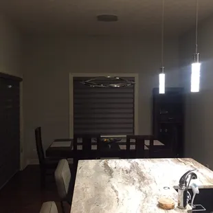 Granite when completed with lights and dinette in background.