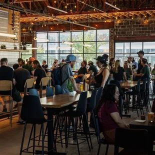 Discover the Aurora Arts taproom at Cerebral Brewing, where community and craft beer come together in a lively, artistic space!