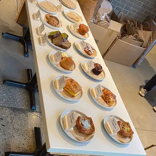 a long table with plates of food on it