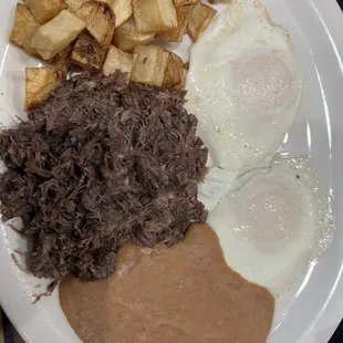 Huevos rancheros with barbarcoa, sauce on the side.