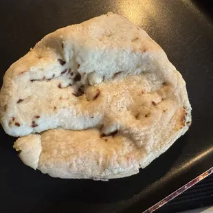 The Pupusas were not cooked all the way they were all white and very thick they were made with a lot of massa