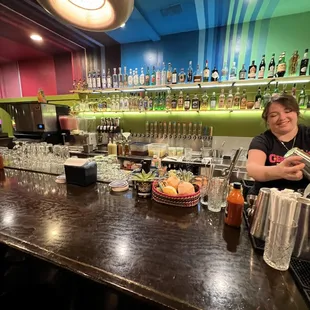 a woman sitting at the bar