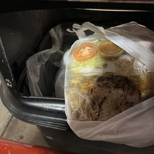 $50 buck into the trash