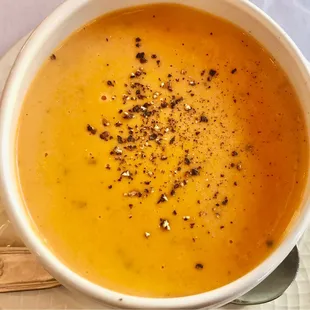 a bowl of soup on a plate