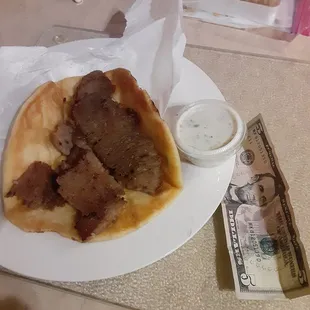 The bill is for perspective on the amount of Cucumber sauce they give.