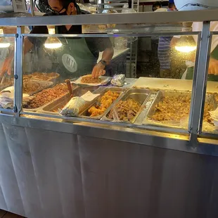 a group of people preparing food