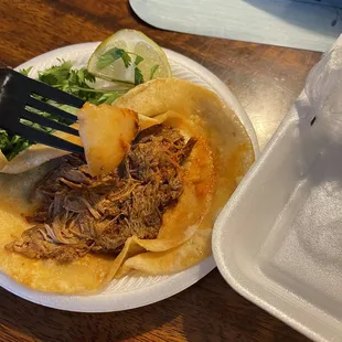 Shredded beef taco with huge potatoes in it