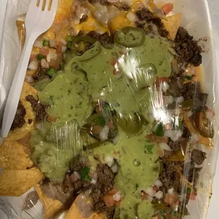Steak super nachos I wish I had a spicy sauce for them