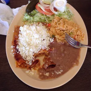 Enchilada platter minus 2 bites