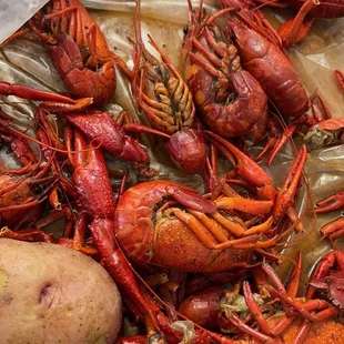 lobsters and potatoes in a plastic bag