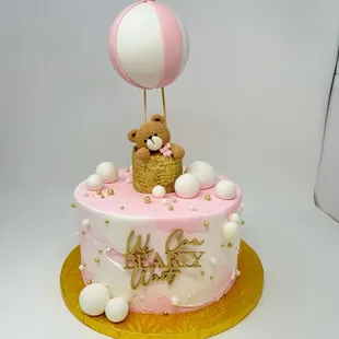 Customized baby shower cake.