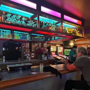 people sitting at a bar