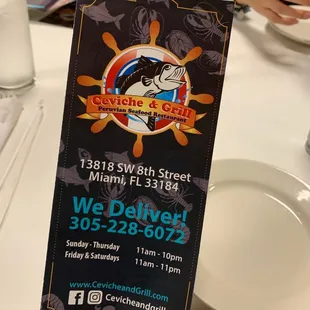 a person holding a menu