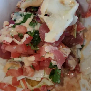 Omg. Tostones covered in tuna, avocado   cabbage, onion. Delish