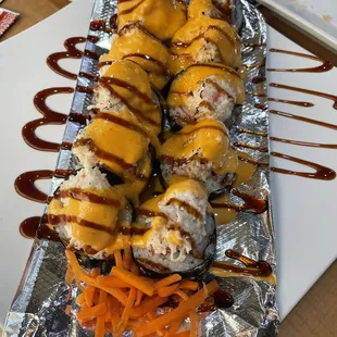 a plate of sushi rolls