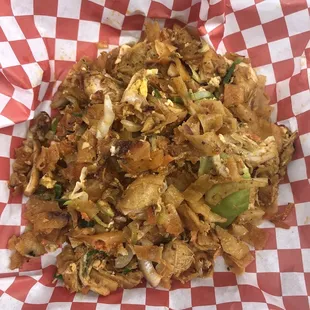 Chicken Kottu - stir fry of shredded roti mixed with veggies, eggs, and chicken curry