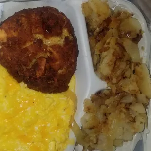 Salmon cake, cheese eggs and homefries. Very filling portion size.