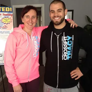 Coach Shan and Coach Chris showing off their new CFT hoodies
