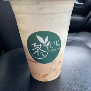 a drink in a plastic cup