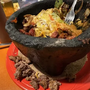 Every bite I had to spit out fat gristle Molcajete horrible