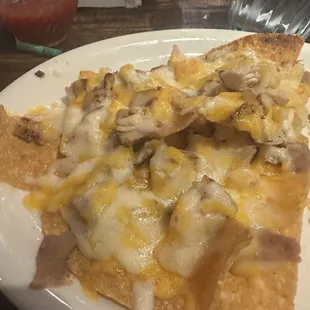 Half order a chicken fajita nachos with plenty of ingredients!