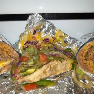 Veggie taco and carnitas taco