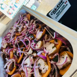 Pan con Chicharron, sweet potatoes, fried chicharron and salsa criolla( pickle onion, mint)