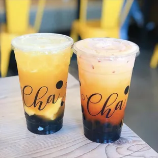 Mango Tea with half boba half pudding and Oolong Milk Tea with boba