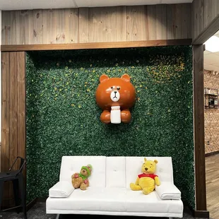 a teddy bear on the wall