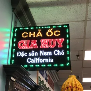 a neon sign for a chinese restaurant