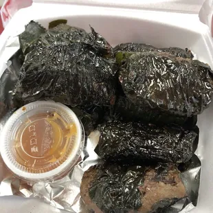 Bo la lot, beef wrapped in betel leaf