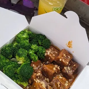a box of food and a drink