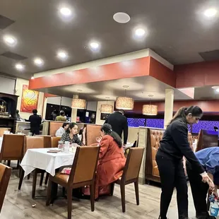 a waitress serving customers