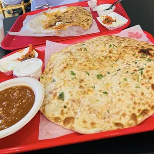 mooli Paratha (half eaten) and Amritsari Kulcha