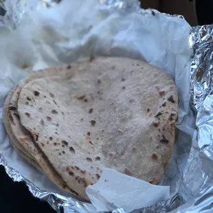 a tortilla wrapped in aluminum foil