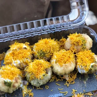 a plastic container filled with food