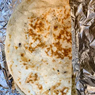 a close up of a flatbread