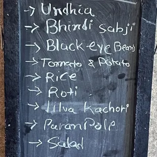 a menu on a chalkboard