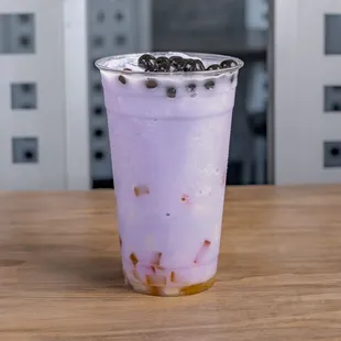 Our Taro Bubble drink with tapioca and jelly topping!