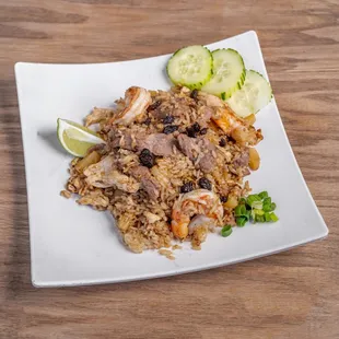 Our Combination protein Chicken shrimp and beef = Hawaiian Fried rice, cook with creamy coconut milk , raisin and mix protein
