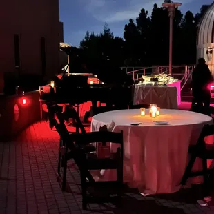 They set up the patio with tables, chair, and heaters.