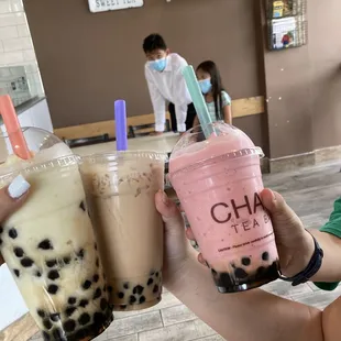 Pineapple and strawberry smoothies with boba