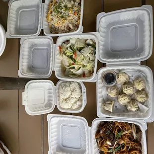 Young Chow fried rice, soup dumplings, lo mein and a assortment of stir fry vegetables.